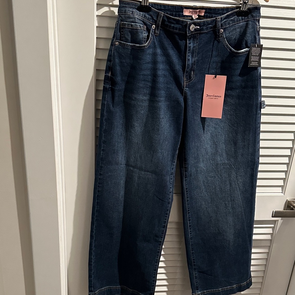 NWT Juicy Couture Wide Legs Pants with Juicy Bling on the Back and one side.